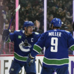 Pettersson scores early in OT, Canucks beat Canadiens 7-6