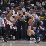 Butler's late flurry helps Heat put away Pacers 87-82