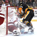 Slavin scores in OT, streaking Hurricanes beat Penguins 4-3