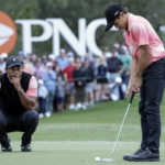 Woods and son hobble to a 59 and are 2 back of Team Thomas