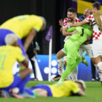 AP PHOTOS: World Cup highlights from Day 18