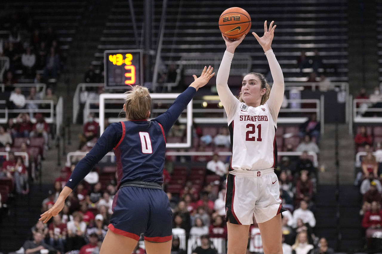 Stanford forward Brooke Demetre (21) takes a 3-point shot over Gonzaga guard Esther Little (0) duri...