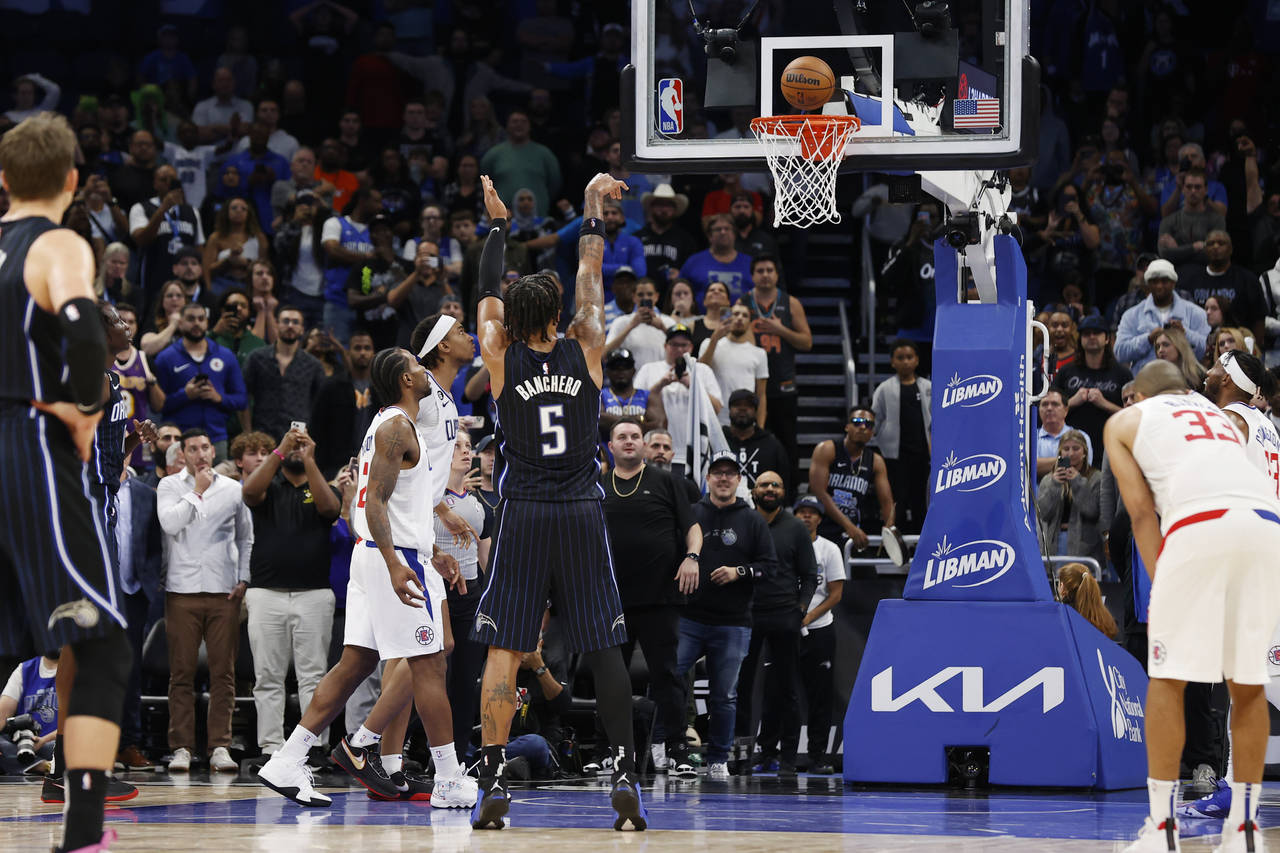 Orlando Magic forward Paolo Banchero shoots.a free throw against the Los Angeles Clipper during ove...