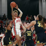 No. 3 OSU's defense forces TOs, tops No. 14 Michigan 66-57