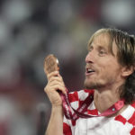 AP PHOTOS: World Cup highlights from Day 23