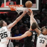 Spurs rout Rockets 124-105 with 26 from Vassell
