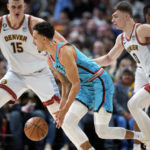 Jokic, Nuggets outlast Suns 128-125 in OT; Booker sidelined
