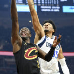 Cavaliers beat Mavericks 100-99 in OT on Allen's slam