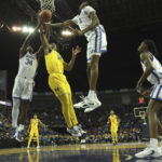 Wallace leads No. 19 Kentucky past Michigan 73-69 in London