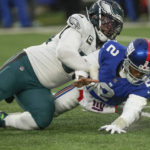 Hurts, Eagles clinch playoffs with 48-22 win over Giants