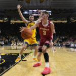 Wahl sparks Wisconsin to 78-75 victory over Iowa in overtime