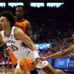 No. 4 Kansas rallies from 15 down to beat Oklahoma St 69-67