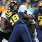 No. 2 Michigan beats Purdue 43-22 for Big Ten crown