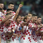 AP PHOTOS: World Cup highlights from Day 23