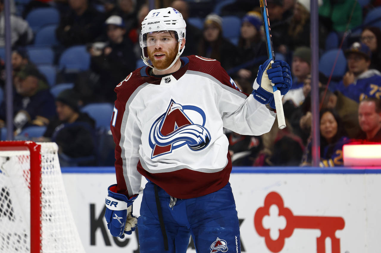 Colorado Avalanche left wing J.T. Compher (37) celebrates his second goal against the Buffalo Sabre...