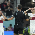 AP PHOTOS: World Cup highlights from Day 19