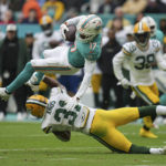 Tagovailoa throws 3 picks, Packers defeat Dolphins 26-20