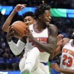 Doncic has 60-21-10, rallies Mavs to wild OT win over Knicks