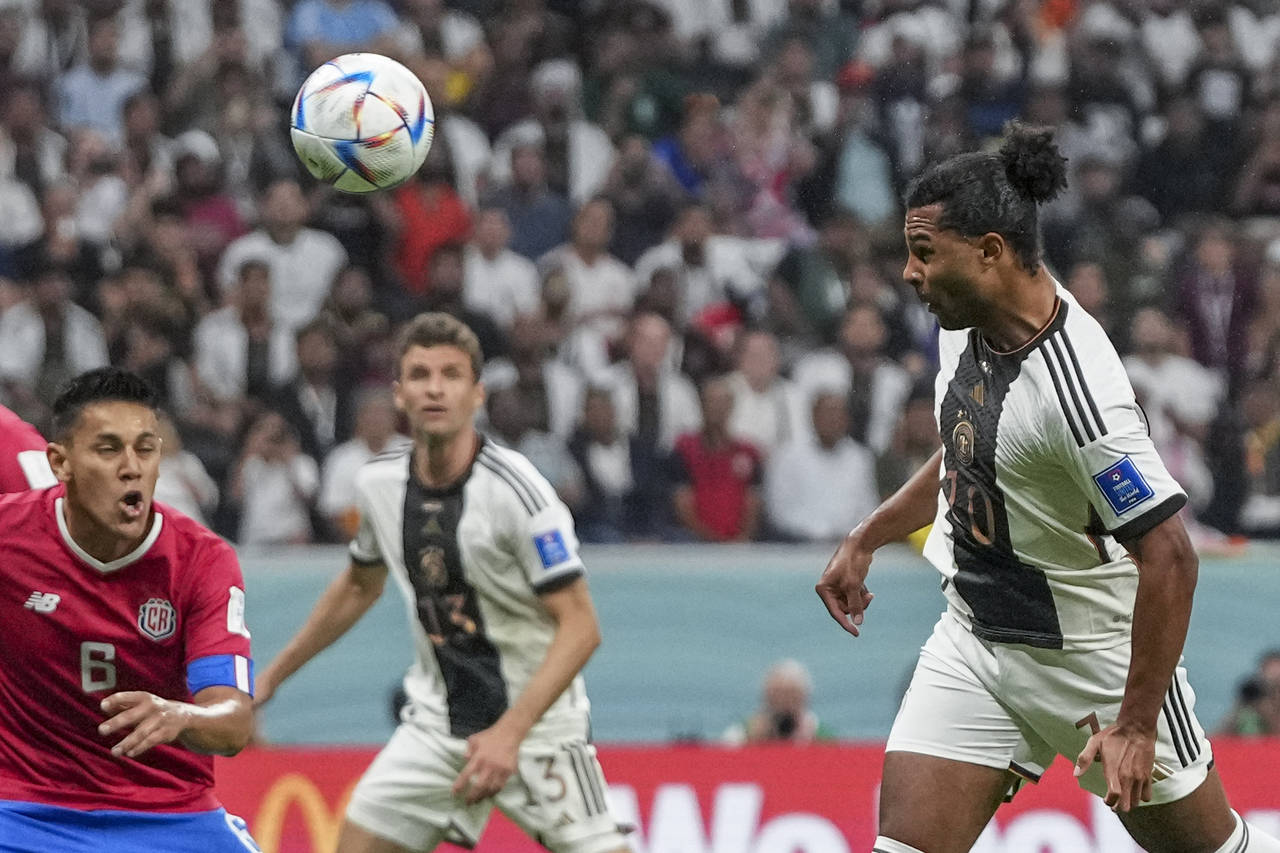 Germany's Serge Gnabry scores his side's opening goal during the World Cup group E soccer match bet...