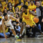 No. 22 Maryland tops No. 16 Illinois 71-66 to stay unbeaten