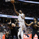 Nets push winning streak to 9 with 125-117 win over Cavs