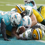 Tagovailoa throws 3 picks, Packers defeat Dolphins 26-20