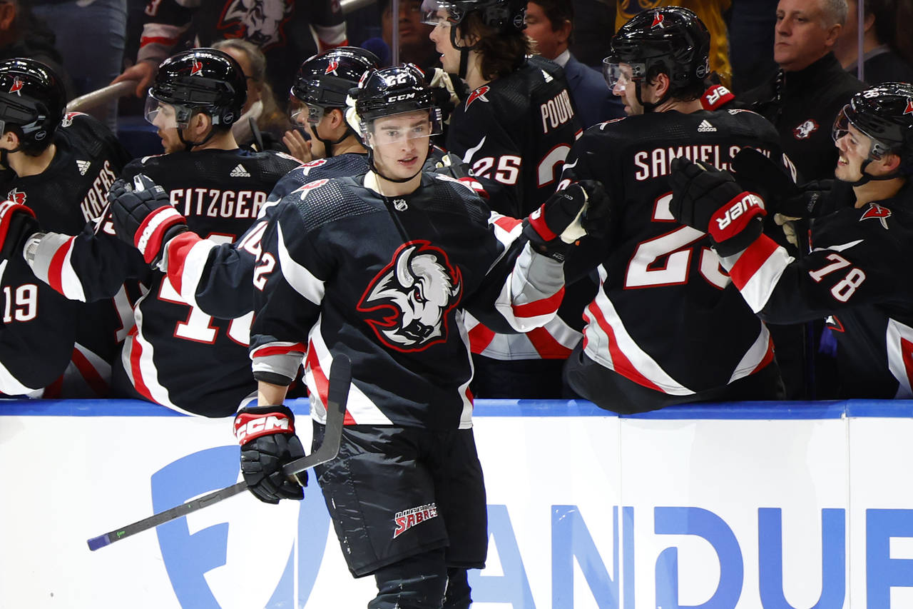 Buffalo Sabres right wing Jack Quinn (22) celebrates his goal during the second period of an NHL ho...