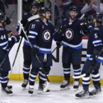 Connor's 3-point game leads Jets past Senators 5-1