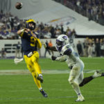 No. 3 TCU upsets No. 2 Michigan 51-45 in wild CFP semifinal
