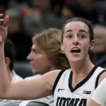 Clark scores 45, but No. 12 NC State tops No. 10 Iowa 94-81