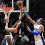 Magic rally past Rockets 116-110 for 7th win in 8 games
