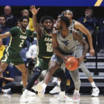 Johnson scores 17 to help West Virginia beat UAB 71-60