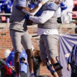 Henigan's three TD passes lead Memphis past Utah State 38-10
