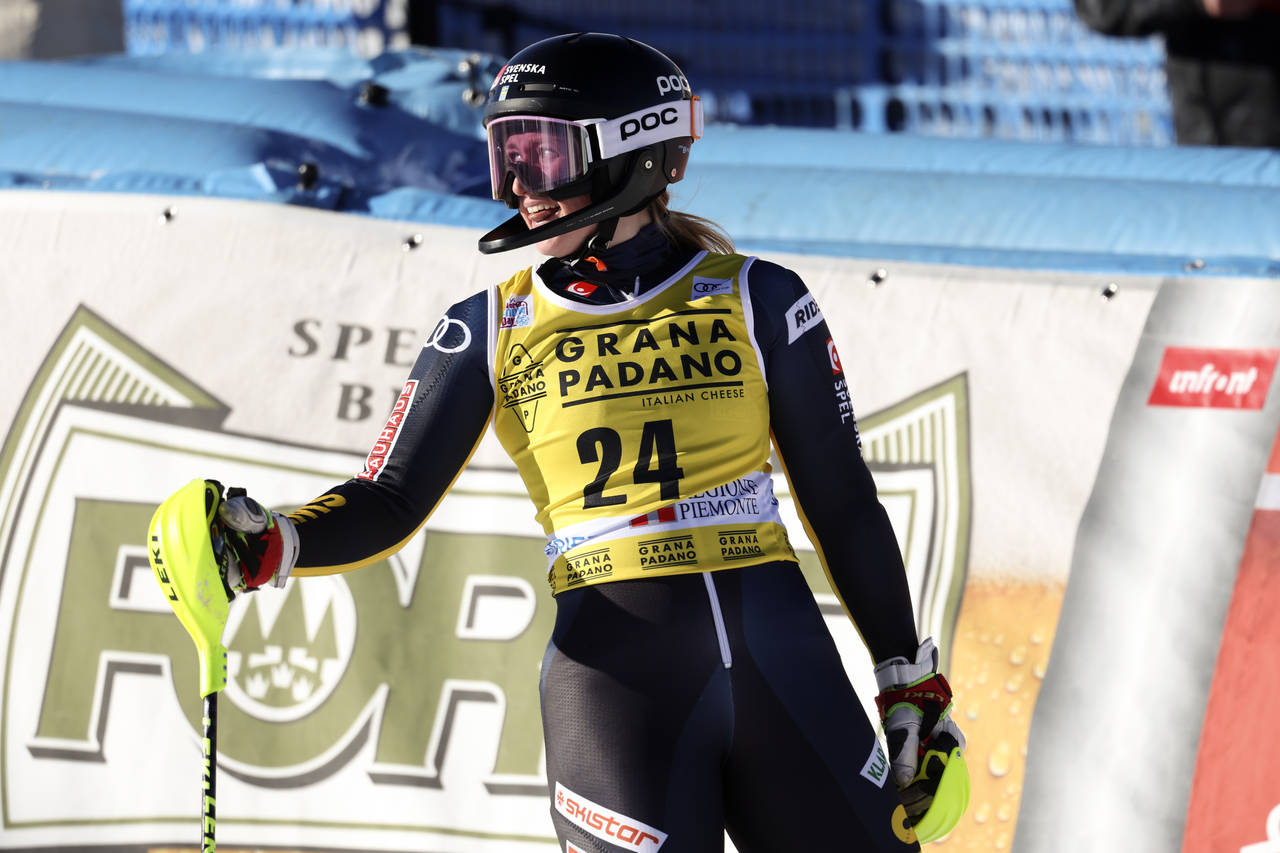 Sweden's Hanna Aronsson Elfman celebrates at the finish area of an alpine ski, women's World Cup sl...