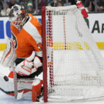 DeAngelo caps Flyers rally for 4-3 OT win over Sharks