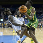 No. 21 UCLA rallies late, hangs on to beat Oregon 65-56