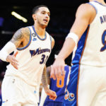 Wizards snap losing streak at 10, beat Suns 113-110