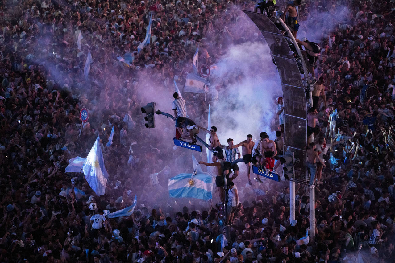 Argentine soccer fans celebrate their team's World Cup victory over France in downtown Buenos Aires...