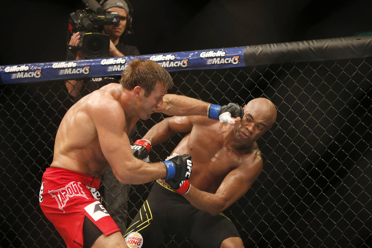 FILE - Anderson Silva, right, of Brazil, fights Stephan Bonnar, of the United States, during their ...