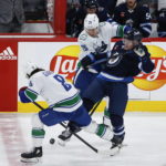 Scheifele scores 3, Jets beat Canucks to snap 3-game skid