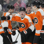 DeAngelo caps Flyers rally for 4-3 OT win over Sharks