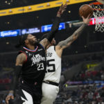 George has triple-double, Clippers beat Timberwolves 99-88