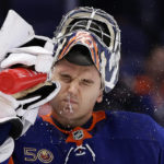 Blues hold off Islanders rally, win 7-4