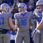 Henigan's three TD passes lead Memphis past Utah State 38-10