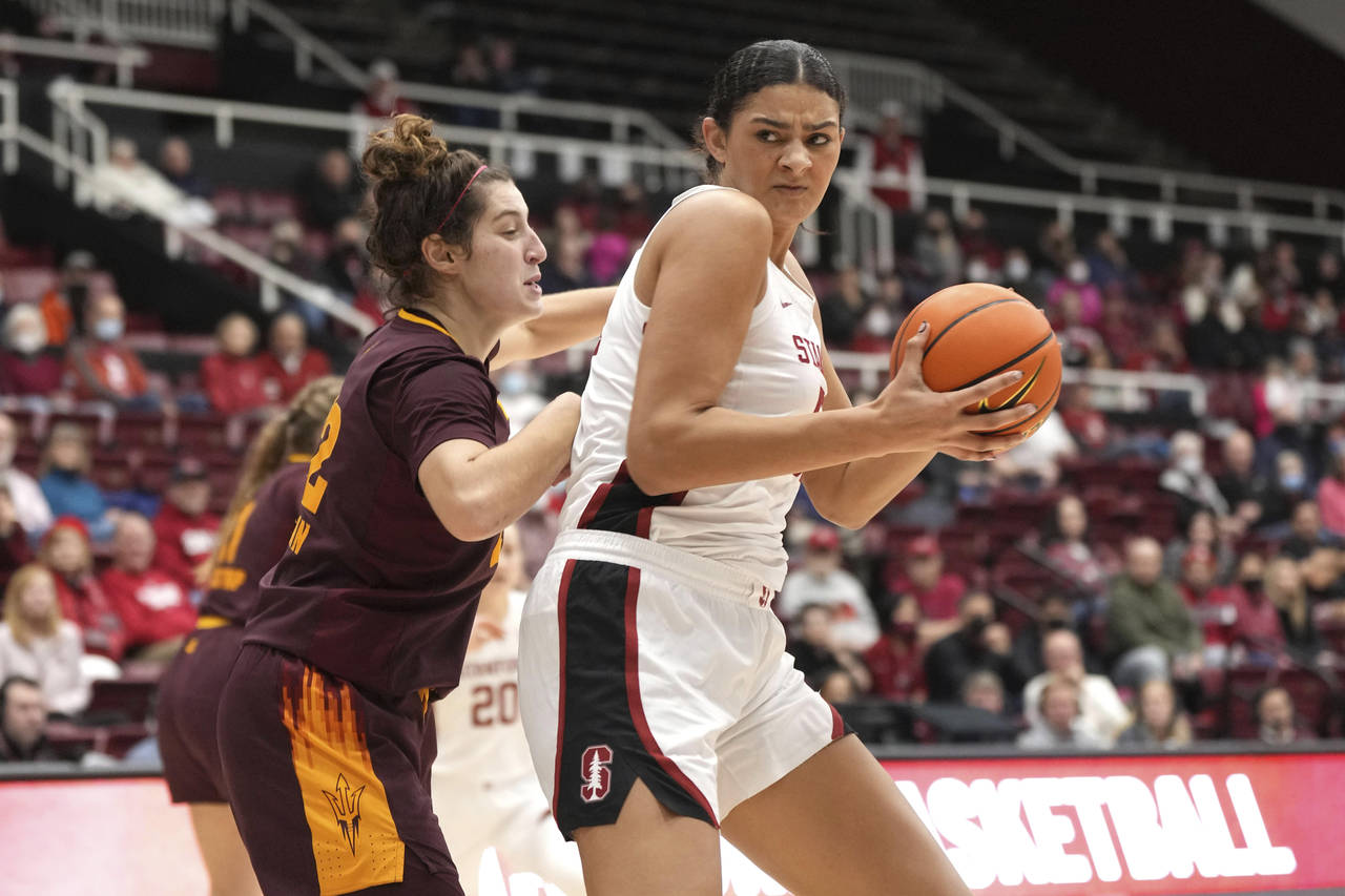 Stanford center Lauren Betts, right, drives against Arizona State forward Meg Newman during the fou...