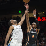 Nets win 10th straight, beating short-handed Hawks 108-107