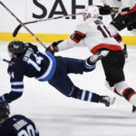 Connor's 3-point game leads Jets past Senators 5-1