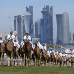 AP PHOTOS: Camels a common sight for World Cup visitors