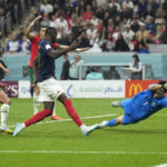 AP PHOTOS: World Cup highlights from Day 21