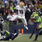 Purdy, 49ers topple Seahawks 21-13, win NFC West